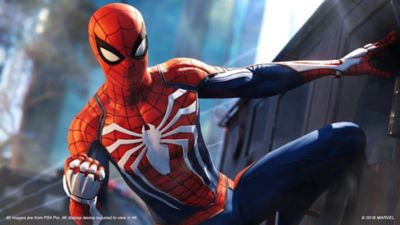 Marvel's Spider-Man Screenshot - Spider-Man hanging from the side of a building, ready for action